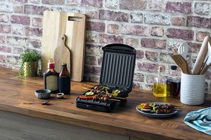 George Foreman 25800 Small Fit Grill in a kitchen.