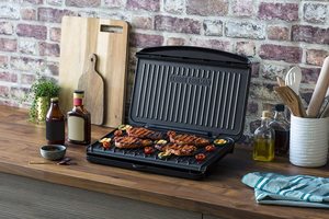 George Foreman 25820 Large Fit Grill in use.
