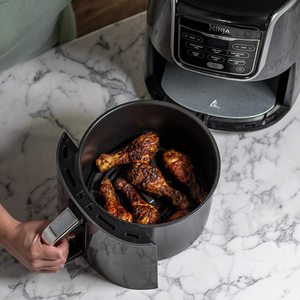 Ninja AF160UK Air Fryer in use.