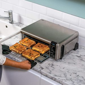 Ninja Foodi 8-in-1 Flip Mini Oven in use.