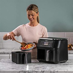 Filling the Ninja Foodi Dual Zone Air Fryer.