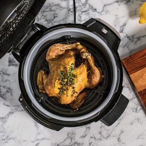 Ninja Foodi OP100UK Mini Multi-Cooker in use.