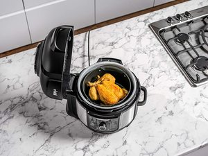 Ninja Foodi OP350UK 9-in-1 Multi-Cooker in use.