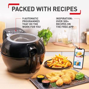 Tefal ActiFry Genius Plus Air Fryer next to fried food.