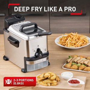 Tefal Oleoclean Compact Deep Fat Fryer in use.
