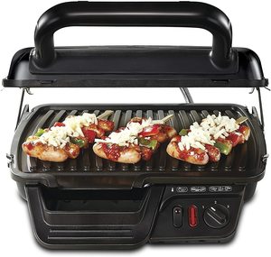 Tefal Ultracompact 3-in-1 Grill in use.