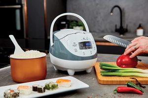 Yum Asia Panda Mini Rice Cooker in a kitchen.